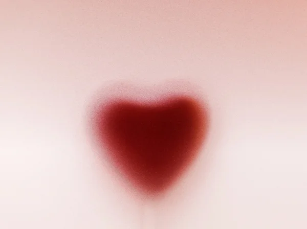 Forma do coração atrás de vidro fosco leitoso. Amor, fundo romântico — Fotografia de Stock
