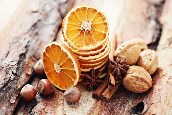 Dry oranges with walnut and cinnamon — Stock Photo, Image