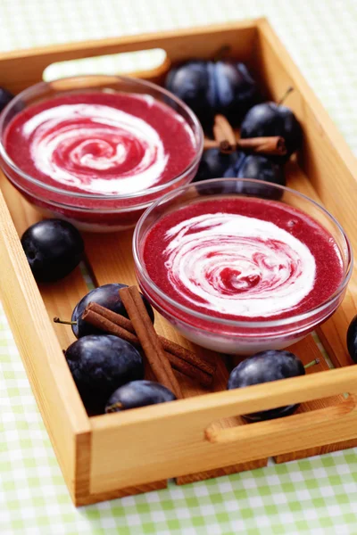 Yogurt with plums — Stock Photo, Image