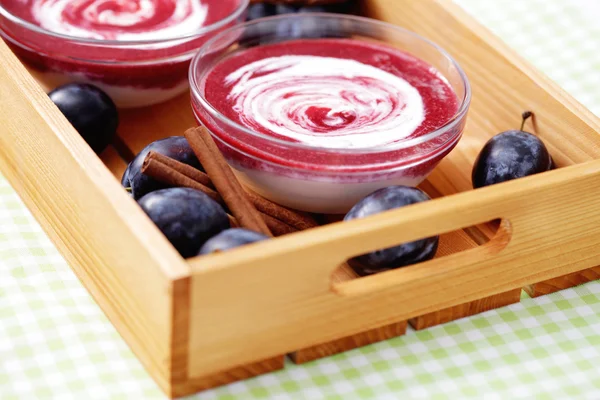 Yogurt with plums — Stock Photo, Image