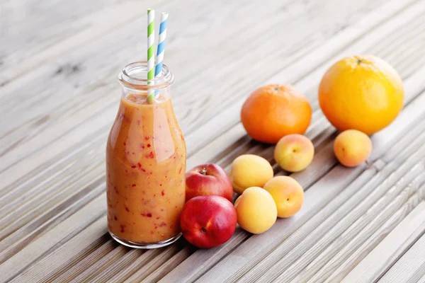 Orange fruity smoothie — Stock Photo, Image
