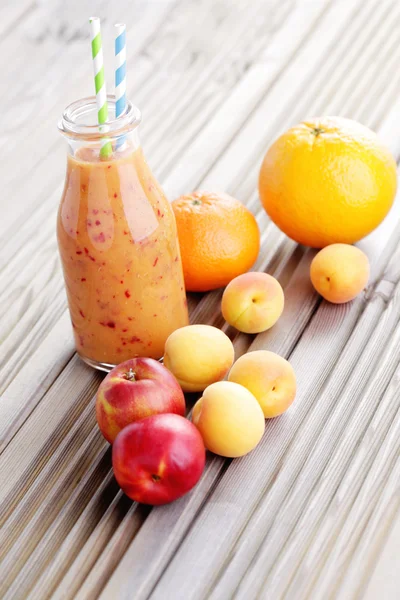 Orange fruity smoothie — Stock Photo, Image