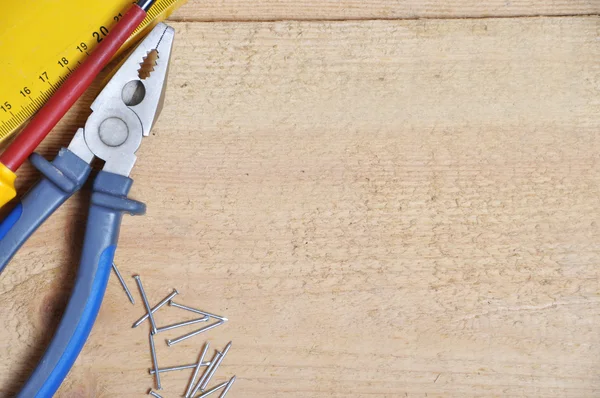 Tools on a wooden background — Stock Photo, Image