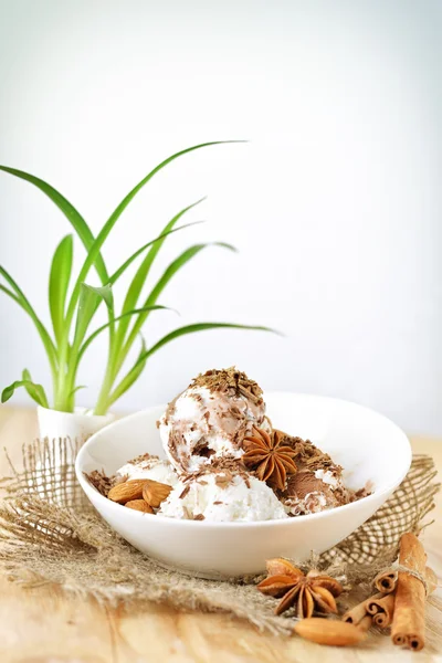 Scoops of ice cream with nuts and chocolate, good for your menu design — Stock Photo, Image