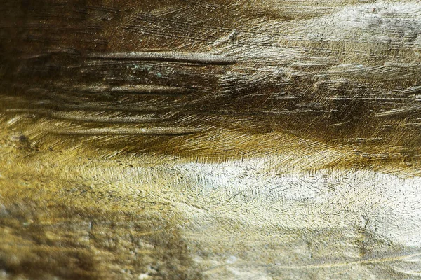 Fondo con textura de cobre. Textura de bronce. Metal curvado con abolladuras y arañazos. Primer plano de la superficie de bronce — Foto de Stock