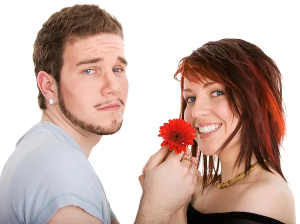 Jeune homme avec fleur et jolie fille — Photo