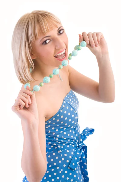Girl in a blue polka dot dress — Stock Photo, Image