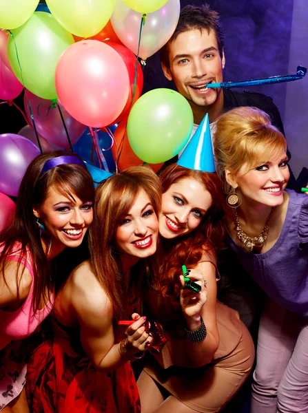 Happy friends on a party Royalty Free Stock Images