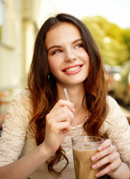 Girl drinking coffee — Stock Photo, Image