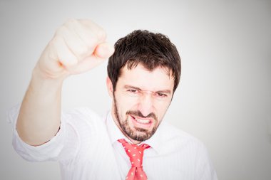 genç işadamı silah tutan ve başarı kutlamak