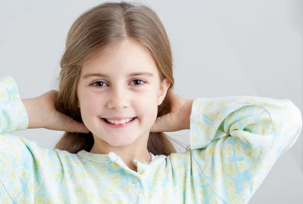 Cute little girl with long hair — Stock Photo, Image