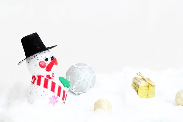 Schneemann und Geschenkboxen — Stockfoto