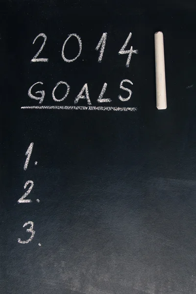 Цели 2014 года words written on the chalkboard — стоковое фото