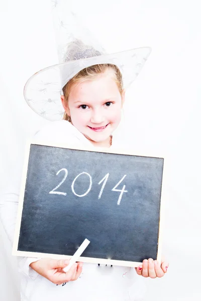 Little girl gazdaság tábla betűkkel 2014. Boldog Újévet — Stockfoto