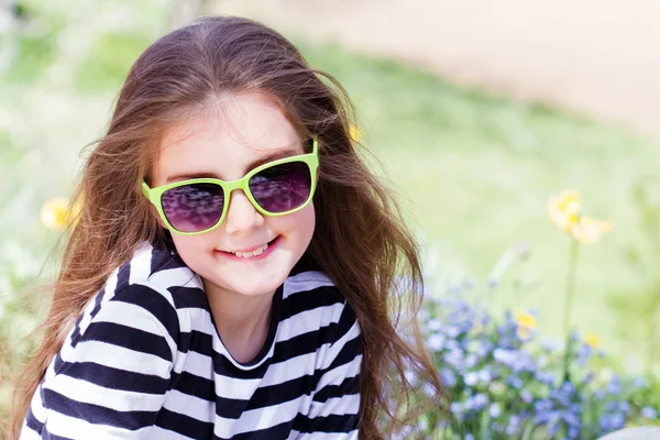 Little girl in spring — Stock Photo, Image