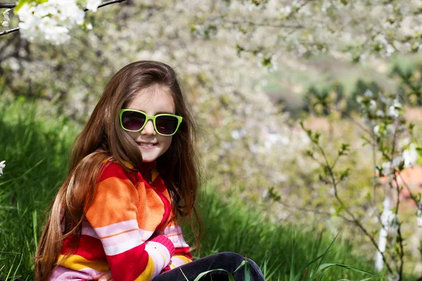 Little girl in spring — Stock Photo, Image