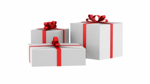 trois boîtes-cadeaux blanches avec ruban rouge et boucle papillon tournent sur fond blanc 
