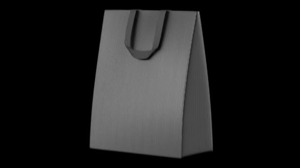 Single blank gray shopping bag loop rotate on black background — Stock Video