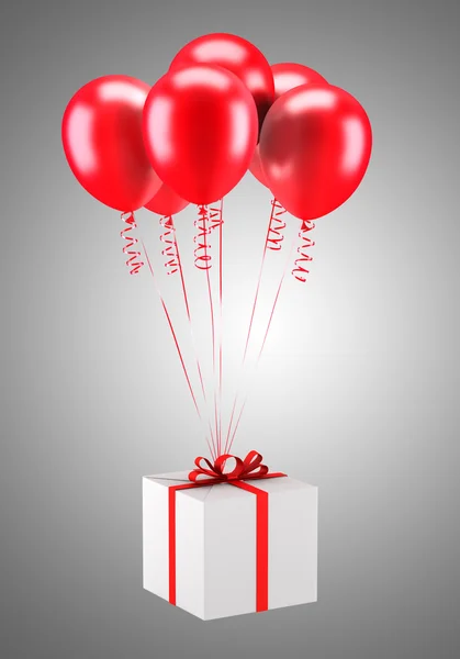 Geschenkbox mit roten Luftballons isoliert auf grauem Hintergrund — Stockfoto