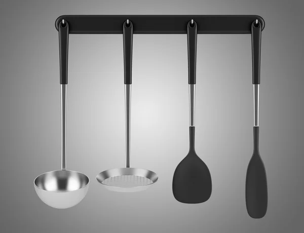 Set di quattro utensili da cucina isolati su sfondo grigio — Foto Stock