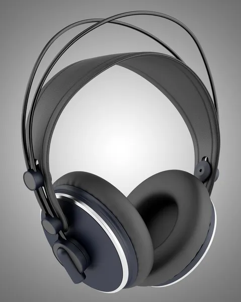 Black wireless headphones isolated on gray background — Stock Photo, Image