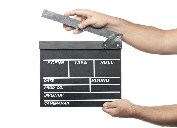 Two male hands holding movie production clapper board isolated o — Stock Photo, Image