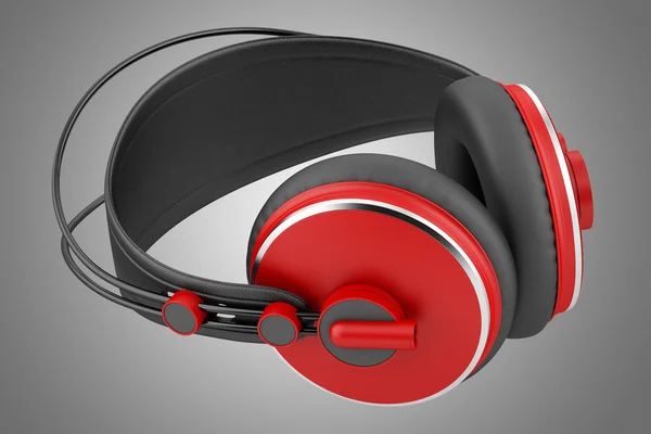 Červená a Černá Bezdrátová sluchátka izolovaných na šedém pozadí — Stock fotografie