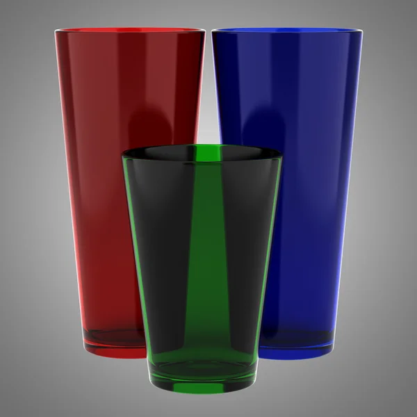 Três vasos de vidro de cor isolados em fundo cinza — Fotografia de Stock