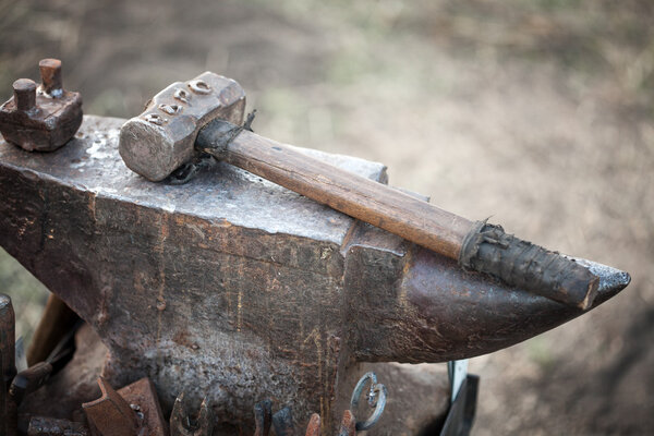 hammer on blacksmith anvil