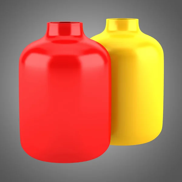 Two red and yellow ceramic vases isolated on gray background — Stock Photo, Image