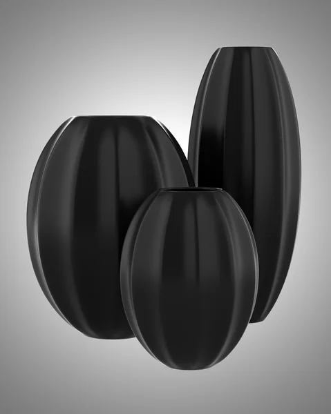 Drei schwarze Vasen isoliert auf grauem Hintergrund — Stockfoto