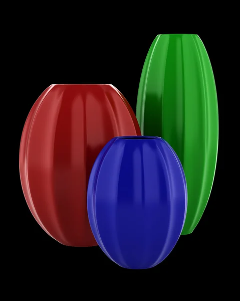 Drei farbige Vasen isoliert auf schwarzem Hintergrund — Stockfoto