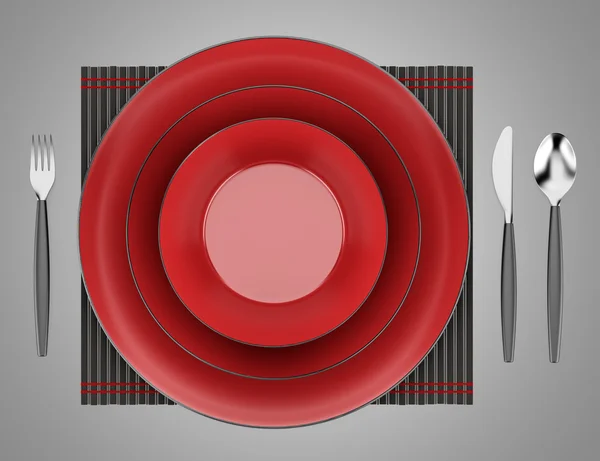 Black and red table setting isolated on gray background — Stock Photo, Image