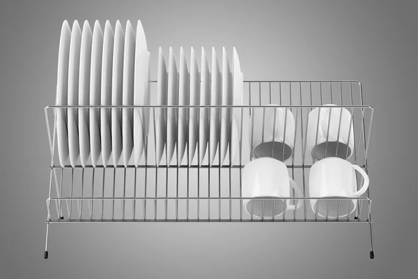 Plate rack with tableware isolated on gray background — Stock Photo, Image