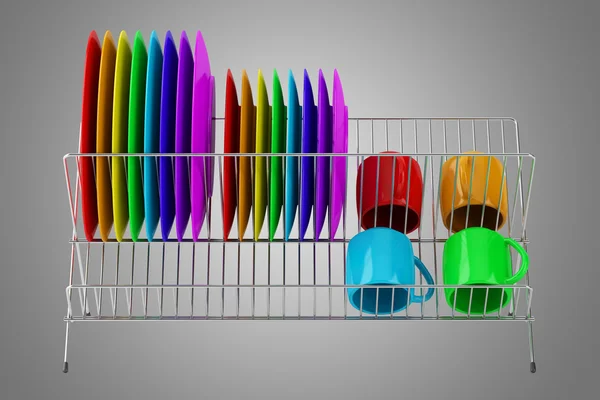 Rack de placa com utensílios de mesa multicoloridos isolados em fundo cinza — Fotografia de Stock