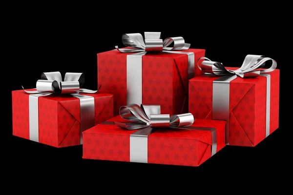 Red gift boxes with silver ribbons isolated on black background — Stock Photo, Image