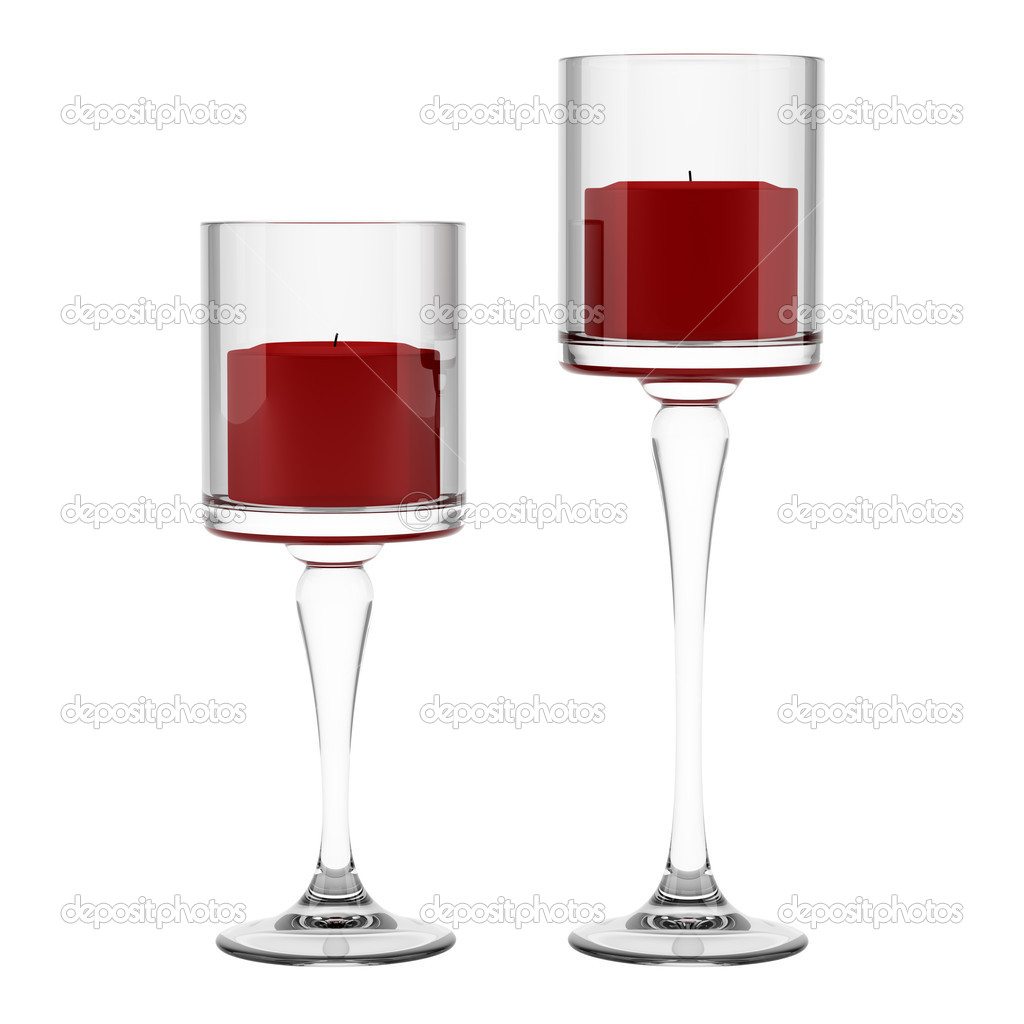two glass candlesticks with red candles isolated on white backgr