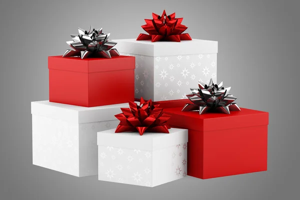 Geschenkboxen mit Bändern isoliert auf grauem Hintergrund — Stockfoto