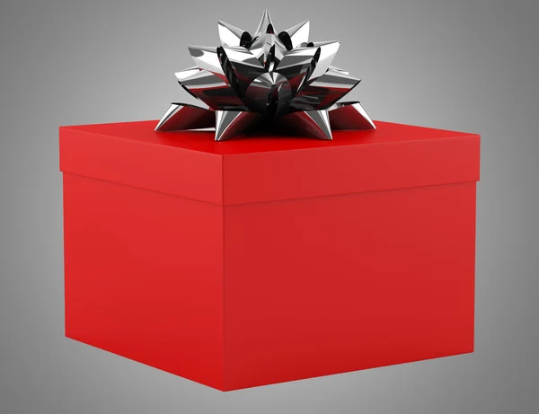 Red gift box with bow isolated on gray background — Stock Photo, Image