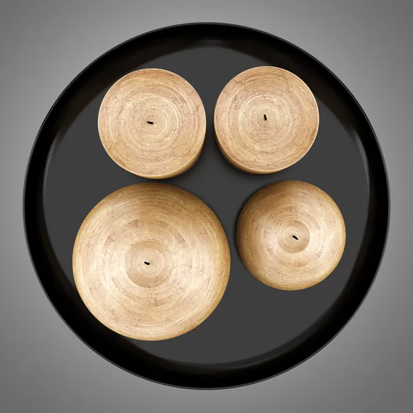 Top view of four brown candles on dish isolated on gray backgrou — Stock Photo, Image