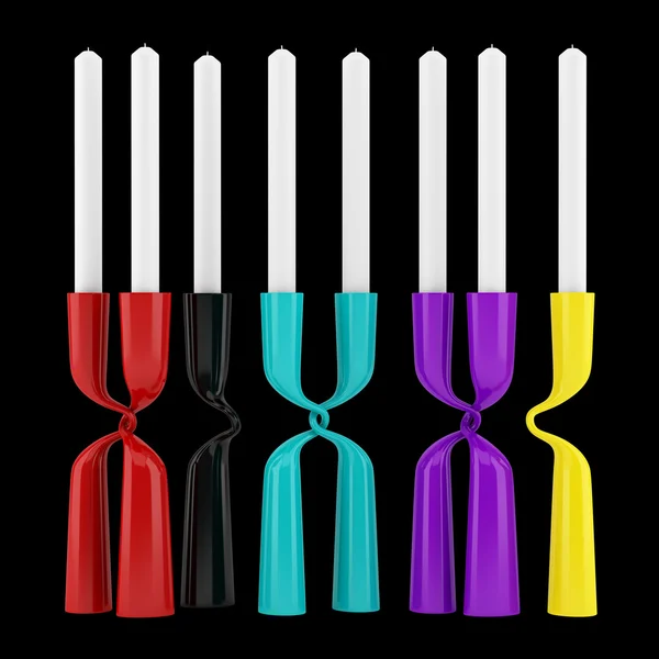 Сучасні різнокольорові свічники зі свічками ізольовані на чорному — стокове фото