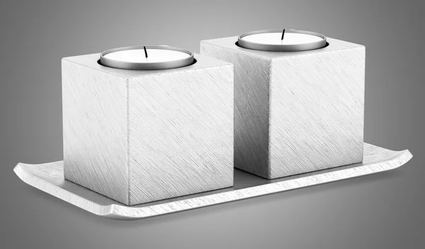 Two metallic candlesticks with candles isolated on gray backgrou — Stock Photo, Image