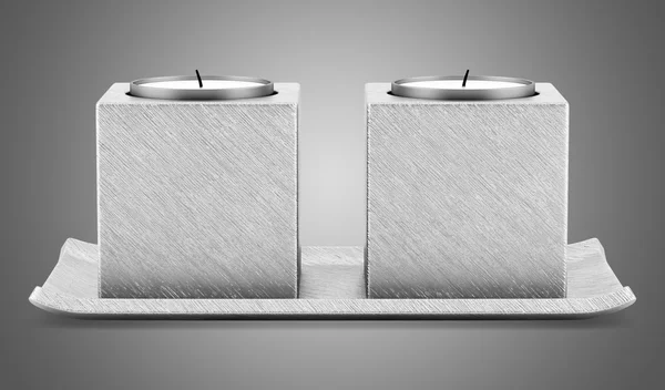 Due candelabri metallici con candele isolate su backgrou grigio — Foto Stock