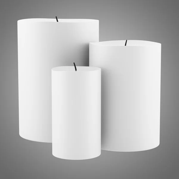 Three candles isolated on gray background — Stock Photo, Image
