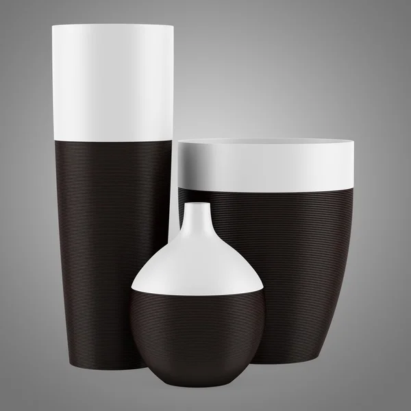 Três vasos cerâmicos isolados sobre fundo cinzento — Fotografia de Stock