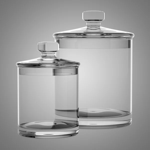 Twee lege glazen potten geïsoleerd op grijze achtergrond — Stockfoto