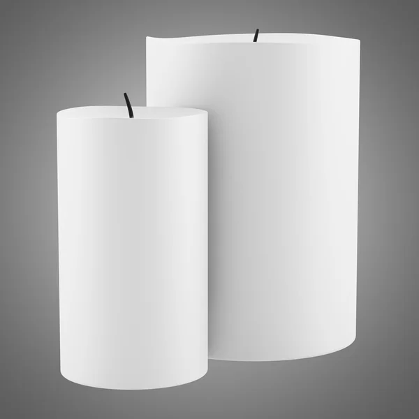 Two candles isolated on gray background — Stock Photo, Image