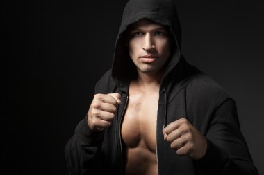 strong man fighter portrait isolated on black background clipart