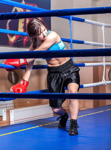 Girl boxer in boxing ring — Stock Photo, Image