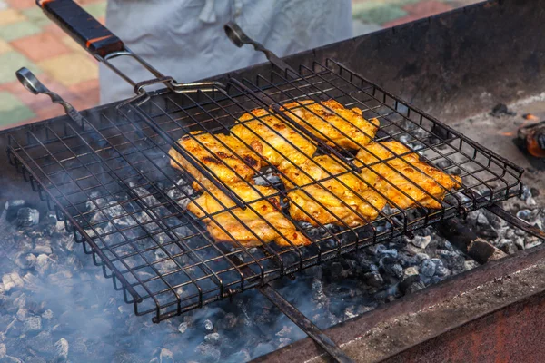Barbecue. Meat fried in a lattice on coals — Stock Photo, Image